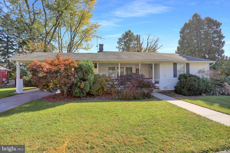 This charming rancher won't last! The spacious backyard with deck, wood stove and hot tub is perfect for entertaining and the front porch and patio add to the outdoor living space. Once inside, this home boasts 3 bedrooms, kitchen, living room with original mid century fireplace, dining room with access to deck and full bath on the main level. The kitchen has marble countertops, gas range, new stainless steel refrigerator and vinyl plank flooring. The lower level has a rec room with bar, wood stove and full bath. In addition, there is a bonus room and large laundry/storage room with washer, dryer, upright freezer and laundry tub. There are so many possibilities - don't miss out!

Updates include windows in the kitchen and living room, front storm door, kitchen flooring and countertops, hallway carpet and fresh paint.