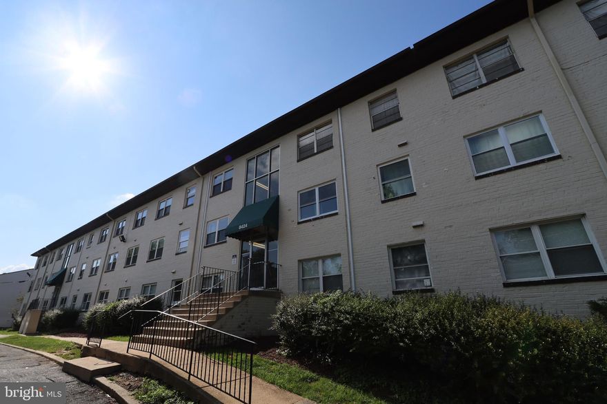 Experience comfort, convenience, and value in this well-kept 2-bedroom, 1-bath condominium in the established Pinewood South community of Alexandria, VA. Located just minutes from Fort Belvoir, Old Town Alexandria, and minutes to 495 about 8 miles from Washington, D.C., this home offers an ideal blend of suburban tranquility and urban accessibility.

Set in a quiet, low-rise, garden-style building with classic mid-century brick construction, the residence features an inviting, open living space with abundant natural light. A sliding glass door off the main living area opens to your private balcony — perfect for enjoying a morning coffee, an evening breeze, or a peaceful view of the community grounds. The floor plan offers two bedrooms with ample closet space, a full bathroom, and a kitchen ready for your personal touch.

The community is designed for convenience and ease. Condo fees include major utilities such as electricity, heating, air conditioning, water, and sewer — plus exterior building maintenance, common area care, trash removal, management, and access to amenities. Residents enjoy an outdoor pool, tot lots/playgrounds, sidewalks, and well-maintained common grounds. Parking is plentiful and unassigned, and the property offers two or more points of entry/exit for safety and convenience.

The building’s durable materials — brick exterior, concrete foundation, and a reliable built-up roof system — speak to its solid construction. Several units in the community also feature accessibility enhancements, including wide doors and level entries, making this a flexible choice for various needs.

Location is a standout feature:

Public transit is steps away, with Fairfax Connector and Metrobus service along Richmond Hwy.

Metro access via Huntington Station (Yellow Line) is within 4.5 miles.

Everyday errands, dining, and shopping are minutes from your door, along with easy access to major commuter routes like Route 1, I-95, and the GW Parkway.

Old Town Alexandria’s historic charm and waterfront are just a short drive, while Washington, D.C., is an easy commute for work or leisure.

For buyers or commuters, the property’s proximity to Fort Belvoir is a major plus. For first-time homeowners, investors, or downsizers, the low monthly condo fee offers exceptional value without sacrificing quality of life.

If you’ve been seeking a well-located, low-maintenance home in a community that covers your essentials, offers desirable amenities, and keeps you connected to the best of Alexandria and the D.C. metro area, 8424 Richmond Hwy #90 is ready to welcome you. Schedule a showing today and experience the benefits of Pinewood South living for yourself.