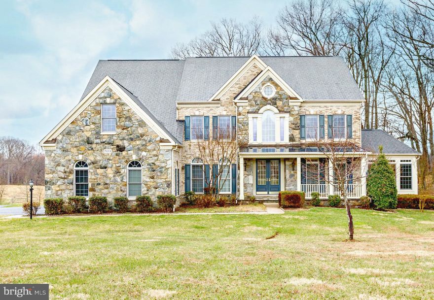 Jaw-dropping 5-bed 4.5-bath home on sprawling 2-acre lot. Enter to elegant 2-story foyer & HW floors throughout. Updated open kitchen feat all stainless-steel appliances & sparkling granite. Relax by dual-sided fireplace or in one of 2 sunrooms. Luxurious master bedroom w/en suite spa-like master bath. 3-car garage. Backs to Agricultural History Park. Convenient to all Gaithersburg has to offer!