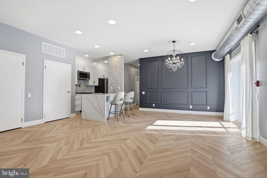 Stunning Fully Renovated Condo with Luxury Finishes & Prime Location

Welcome to this beautifully reimagined, move-in-ready condo that perfectly blends modern luxury with everyday convenience. From the moment you step inside, you’ll be impressed by the thoughtful design, high-end finishes, and bright, open layout.

The spacious living area features 9-foot ceilings, elegant lighting, and a striking designer accent wall, creating a sophisticated yet inviting atmosphere. The chef-inspired kitchen boasts sleek cabinetry, premium appliances, and a stylish island with waterfall countertops...perfect for entertaining or everyday living.

The home has been fully renovated from top to bottom, including a brand-new HVAC system, water heater, and appliances, giving you peace of mind for years to come. Both bathrooms are outfitted with floor-to-ceiling tile work, delivering a spa-like experience.

Step outside to enjoy an expansive 280 sq ft private patio, ideal for relaxing, hosting, or creating your own outdoor oasis.

Highlights:
 2 deeded parking spaces,  7-minute walk to the train station, 8-minute walk to Main Street (shopping, dining, and entertainment), Fully renovated with high-end finishes throughout, New HVAC, water heater, and appliances, Floor-to-ceiling tile in both bathrooms, 9-foot ceilings, 280 sq ft private outdoor patio, Prime location near major highways and universities, Located in a friendly, welcoming neighborhood

This home offers the perfect combination of luxury, location, and lifestyle. Whether you’re commuting, entertaining, or simply enjoying your space, this property checks every box.