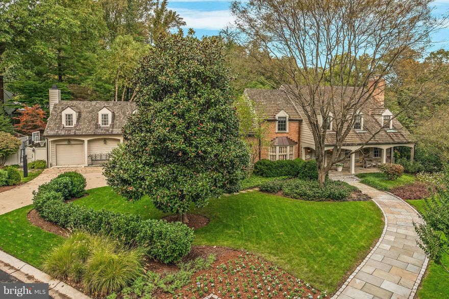 Beautiful home on .6 acre with 4 finished levels/6,700SF; 5BR/4BA up; family room, gourmet kitchen, breakfast room and office open to a landscaped terrace, covered porch and heated pool. Generous living room, dining room and formal study/den. Add'l wing w/mudroom, laundry, game rm; 3 garage spaces. Fully finished LL w/family room, wine cellar, gym.