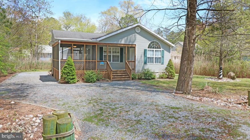 Pride of ownership shows in this furnished move-in ready home! Enjoy one-level living with 3 bedrooms, 2 baths in a popular open concept floor plan. Fresh paint throughout. Living area features a cozy gas-log fireplace with TV Shelf and Cathedral ceiling. Kitchen and dining areas leads to a huge (20' x 10') screened in porch and patio. Additional vaulted ceiling gives a spacious feel to the master bedroom.   Energy efficient appliances include an elevated  Gas-Package HVAC (2018) and a newer washer and dryer (2015) located in the laundry room.  Conditioned Crawl Space w/ humidifier just installed. A complete list of furnishings is included and what you see is what you'll get.  There is even room to park your boat and trailer as well as plenty of driveway for several vehicles.  This property is close and convenient to the South Gate Pond and Library or Sports Core Year Around Pool. Experience all that Ocean Pines has to offer w/amenities including indoor and outdoor pools, golf, beach club, marina, fitness, farmer's market, and more! Don't let this one get away before you have an opportunity to see it. Book an appointment today!