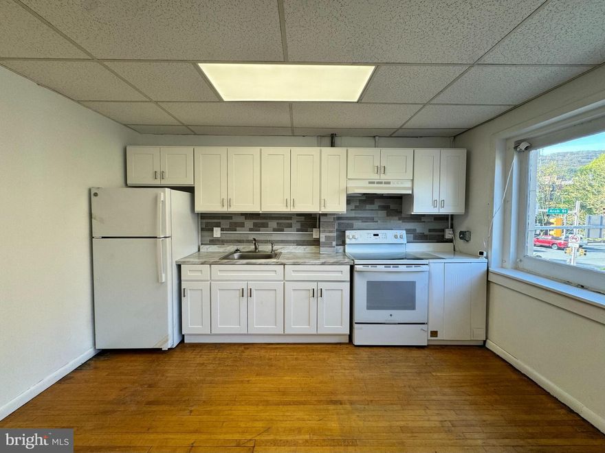 Nicely renovated 2 bedroom, 1 bath second floor apartment in the heart of Pottsville!  Located on a main street of Pottsville, close to all amenities and local transportation systems.  There is a wall-unit AC included. 
 New kitchen with fridge and stove included.  BONUS: Landlord pays for heat, water, sewer, trash, and wireless internet.  Tenant pays electric only, as well as parking, if needed. A parking pass can be acquired through the City of Pottsville Parking Authority by the tenant, if necessary ($50/year presently).  Needed to move in: first month ($1,000), last month ($1,000), security deposit ($1,000) for a total of $3,000