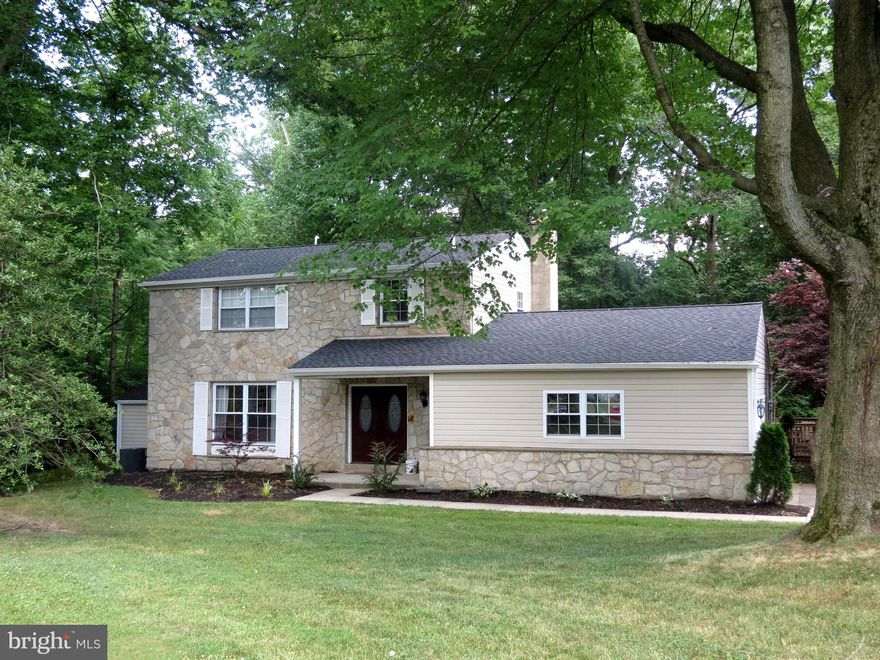 COMPLETELY UPDATED 4 BEDROOM/3 FULL BATH HOME ON BEAUTIFUL WOODED LOT AT THE END OF A CUL DE SAC. THIS HOME FEATURES FRENCH ENTRY DOORS, HARDWOOD FLOORS, AN OPEN MAIN LIVING ROOM/KITCHEN/DINING AREA COMPLETE WITH A LARGE ISLAND, GRANITE COUNTERTOPS, AND STAINLESS STEEL APPLIANCES (INCLUDING A BUILD IN WINE FRIDGE).  SECOND LIVING ROOM/DEN FEATURES VAULTED CEILING, BUILT IN SHELVING AND A STONE FIREPLACE WITH A GAS INSERT AND THERE IS A FULL FIRST FLOOR BATHROOM. THE SECOND FLOOR HAS 4 BEDROOMS WITH A FULL HALL BATH AND LAUNDRY AREA. MASTER BEDROOM HAS A FULL BATHROOM AND WALK IN CLOSET. ALL BATHROOMS HAVE BEEN METICULOUSLY REMODELED. THE BACK YARD AREA HAS A LARGE DECK PERFECT FOR ENTERTAINING WITH SEVERAL SEPARATE AREAS AND A LARGE COVERED DECK WITH POOL TABLE AND GRILL. THIS HOME HAS BEEN ALMOST FULLY REMODELED IN THE PAST 5 YEARS INCLUDING A NEW ROOF AND DUAL ZONED HVAC. THIS HOME IS MOVE IN READY.