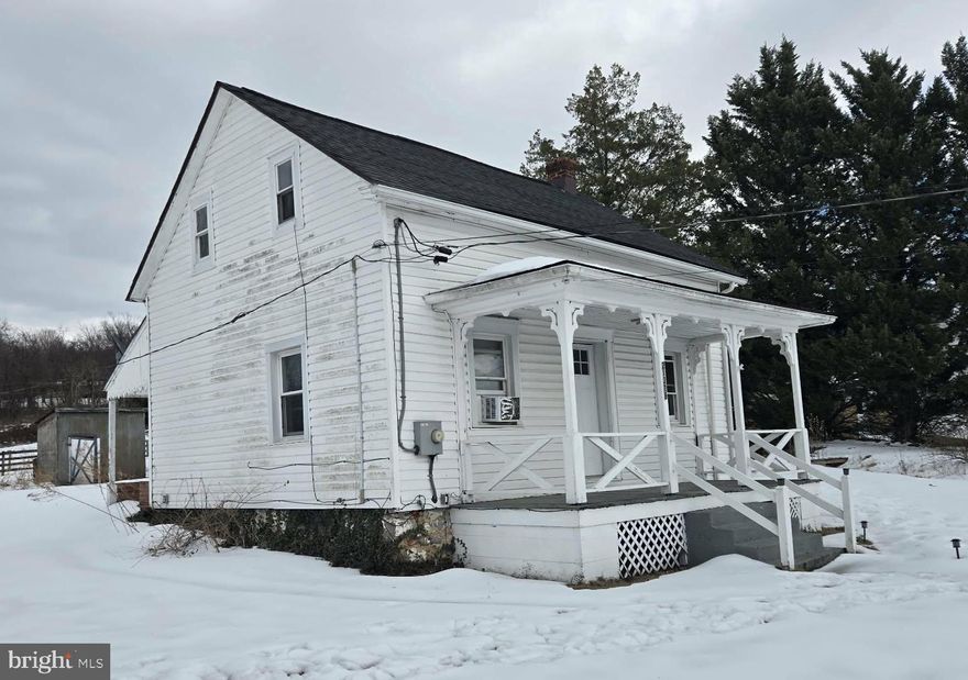 This 2-bedroom, 1-bath farm-style home is located in Boonsboro, just off Route 40, with convenient access to Hagerstown and Interstate 70 for commuting and travel.
The home features a spacious kitchen with ample cabinet and counter space, along with room for a dining table. Nice-sized family room at the front of the home. There are two bedrooms, one full bathroom, and a separate laundry room. The layout is practical and easy to maintain, making good use of the available space.
Outside, there is a back patio and yard area suitable for outdoor seating, gardening, or general use. Surrounding farmland contributes to the quiet setting and open views. The property is served by a cistern for water and a private septic system.
Situated on a low-traffic street, the home offers a rural environment while remaining within a short drive of nearby towns, shopping, and major roadways.