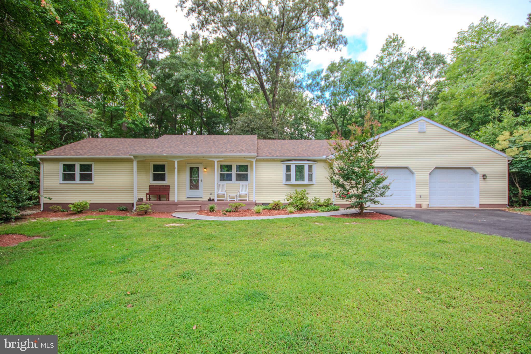 Welcome home! Move in now and update to your personal preferences to earn instant equity! Plenty of space to spread out - your front room makes a perfect dining room or den, eat in kitchen with plenty of storage, room for entertaining in your living room with office space! No shortage of space in the primary bedroom with huge walk in closet and attached full bathroom with a soaking tub. If the main closet space isn't enough storage - you also have a spacious pull down attic and over sized attached garage with additional storage space! All located on a 1 acre lot that backs to field land giving it the private Eastern Shore feel!