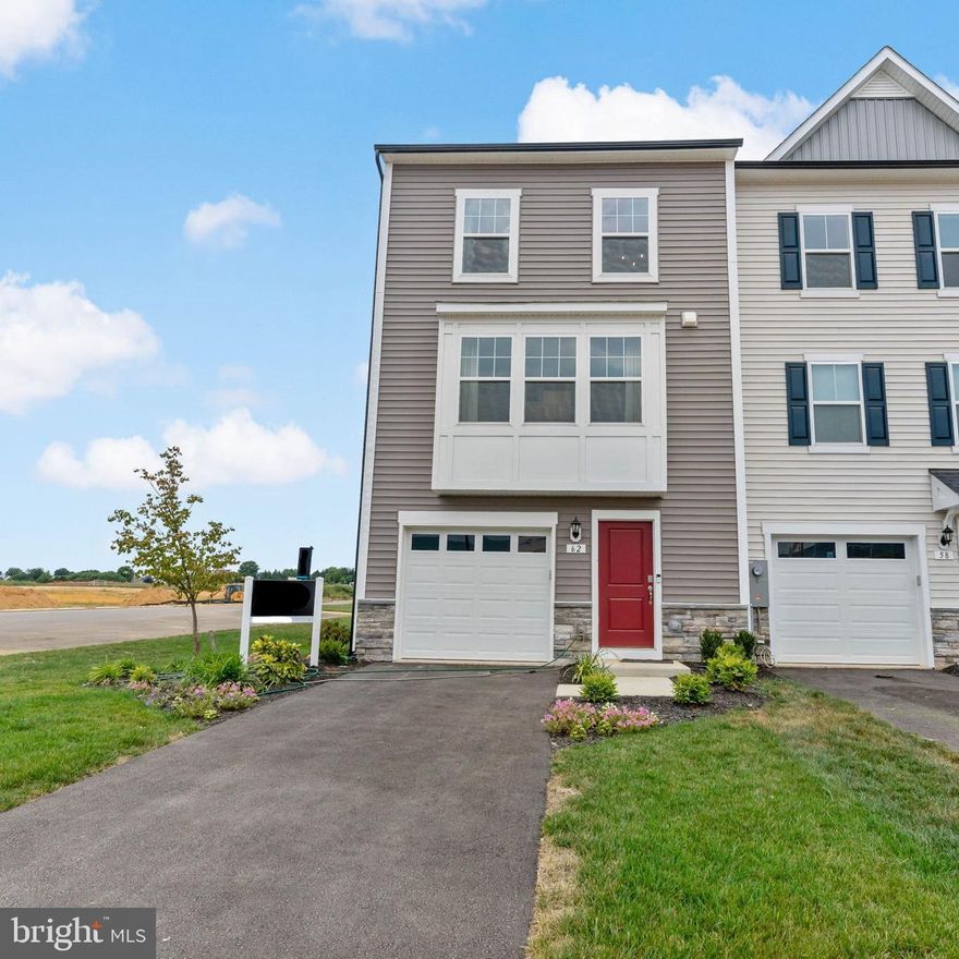 THE BEST VALUE PER SQUARE FOOT IN Charles Town, WV *NOW OFFERING UP TO $12,500 IN CLOSING COST ASSISTANCE FOR PRIMARY RESIDENCE WITH USE OF APPROVED LENDER AND TITLE.* 
Model Home for Sale! This beautifully appointed 3-bedroom, 3.5-bath townhome in Charles Town offers designer upgrades throughout and stunning mountain and tree-line views from the front. The main level features a kitchen island, pendent lights over the upgraded quartz countertops, and upgraded soft closed sand-colored cabinetry, perfect for both everyday living and entertaining. Elegant upgraded tile accents all bathrooms, adding a modern, high-end touch. Enjoy outdoor living on the spacious 14x10 deck. This move-in-ready model showcases thoughtful design, premium finishes, and scenic surroundings, don’t miss this exceptional opportunity!