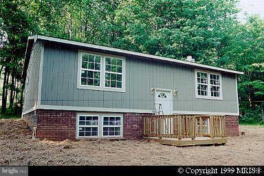 Great Location for this 3 bedroom home nestled on a park-like setting. Beautiful fenced in back yard. Within two miles to Deep Creek Lake.