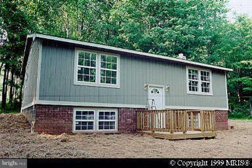 Great Location for this 3 bedroom home nestled on a park-like setting. Beautiful fenced in back yard. Within two miles to Deep Creek Lake.