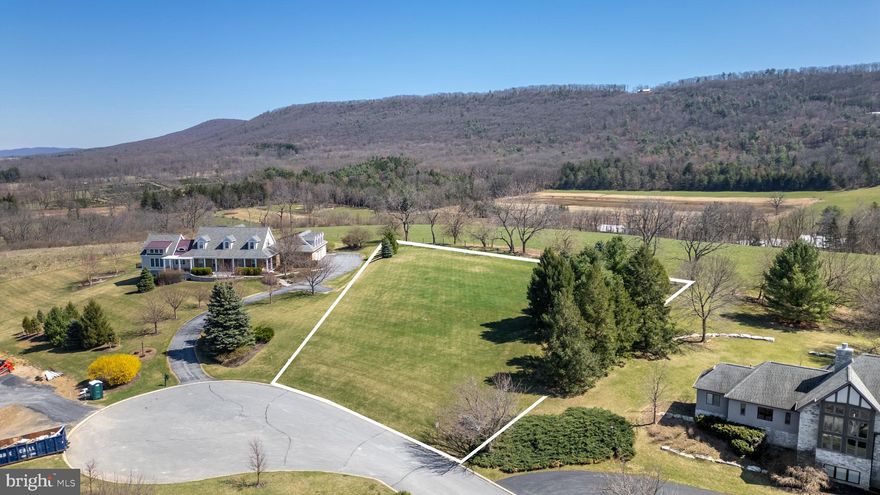 Have you been waiting for the perfect building site to build your dream home?  You may have just found it!  This stunning Laurel Hills lot offers breathtaking 360-degree views and is arguably the premiere homesite remaining in the area.  From your future back patio, you'll enjoy sweeping views of Tussey Mountain and the ski area.  Out front, take in the beauty of Mount Nittany, with the Bald Eagle Ridge and the downtown State College, Beaver Stadium and campus skyline visible just to the west.  This property is in the State College School District, is served by public sewer and is protected by community covenants to help maintain long-term value.  Though it feels private and secluded, you'll enjoy quick access to Rts 322 and 99, making it easy to reach Boalsburg Village, downtown State College, PSU campus and Wegmans.