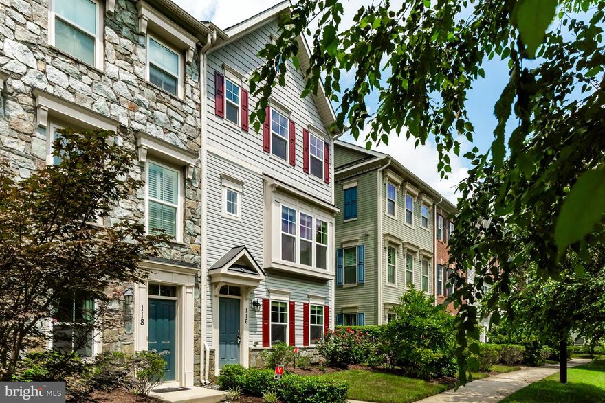 Location, lifestyle, and move-in-ready living come together in this meticulously maintained four-level end-unit townhome in the gated Village Greens of Annapolis. Just 5 minutes to Annapolis, enjoy quaint shops, fine dining, walking tours, waterfront activities, water taxi access, and year-round entertainment. Nearby Eastport, Quiet Waters Park, shopping, dining, and major commuter routes make this location exceptional.

Built in 2016 and set within a manicured courtyard, this home offers 4 bedrooms, 3 full baths, and 2 half baths. Fresh paint, new carpet, wood floors, a resurfaced driveway, and freshly painted exterior shutters create a true move-in-ready opportunity.

The entry level provides flexible space for a home office, media room, or gym, along with a half bath and a spacious two-car garage. The main level features an open-concept living area with a chef’s kitchen, granite countertops, a center island, stainless steel appliances, gas cooking, a glass tile backsplash, abundant cabinetry, and an oversized pantry. A double-sided gas fireplace connects the sitting room to the Trex deck for seamless indoor-outdoor living.

The third level includes two bedrooms, a full bath, laundry, and a well-appointed primary suite with double vanity, walk-in shower, designer tile, and private water closet. The fourth level offers a light-filled bedroom with skylights, a walk-in closet, and an en-suite bath—ideal for guests.

Residents may access a nearby pool, fitness center, and workspace for a nominal fee. With its gated setting, courtyard location, and close proximity to everything Annapolis offers, this home delivers comfort, convenience, and an effortless lifestyle.