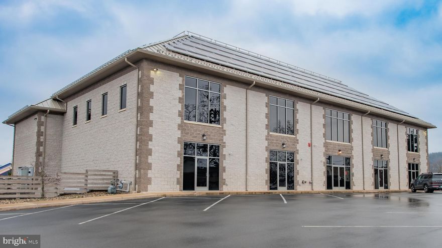 Class A building offering retail, office and warehouse space. High visibility in a great location surrounded by national retailors. Drive-in doors and private parking. A portion of the second floor office space is Tenant occupied. Call Tiffany Cioffi or Rob Pierce for additional information