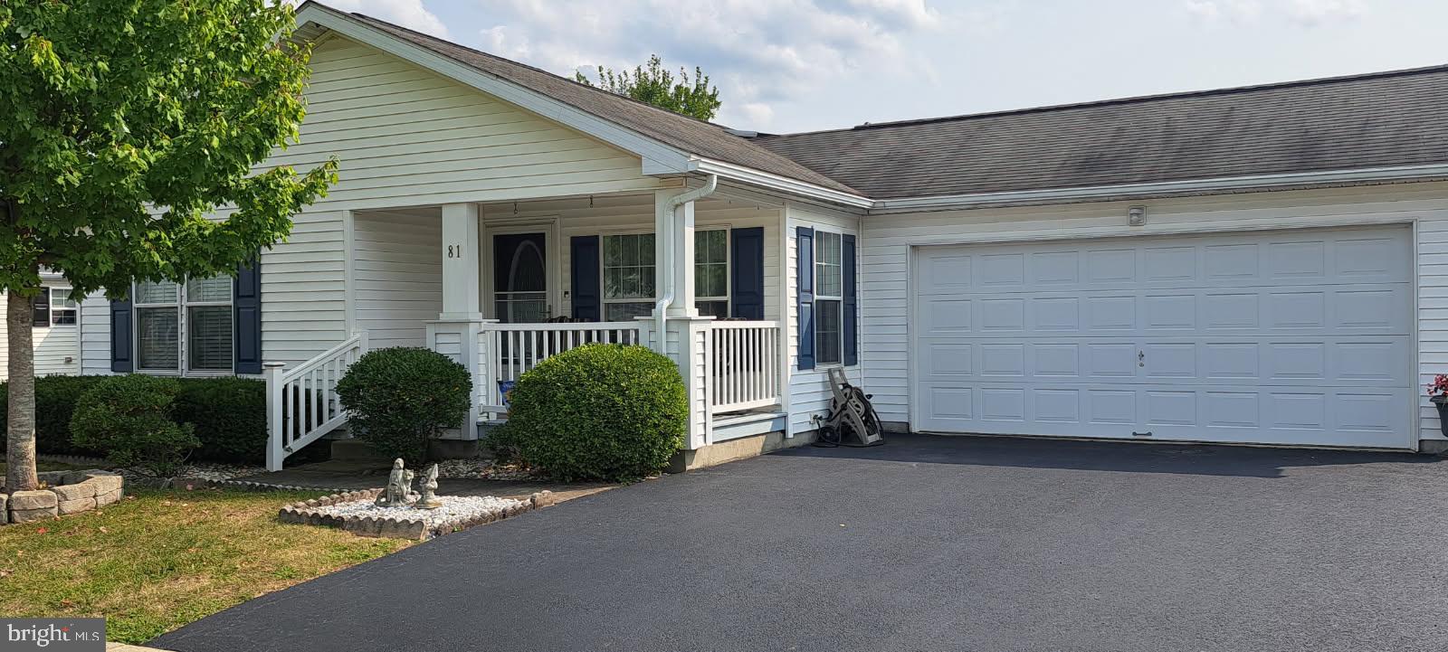 PHOTOS to be uploaded soon! Utopia awaits at Douglass Village. This gorgeous home is surrounded by tranquility, mountain views and blue skies, yet it is close to shopping and many conveniences. This is just the beginning of life in Happy Valley. Travel is simple with US Route 422 and PA Route 724 just several minutes away. This 55+ community is active with a gym, community center and a pool. Manufactured by Marlette, 81 Westin is the "custom design" by owner of the Maple III Model by Legacy II with a unique, extended, enlarged bedroom. The front porch of this home is very welcoming and nice to relax enjoying the Autumn weather. It is perfect to decorate for the upcoming holidays. As you proceed in the front entrance the sizable living room with a double window is bright and airy. The adjoining dining area is ready to receive your guests to enjoy Thanksgiving dinner with family and friends. Close by, a laundry room with washer/dryer and built in utilitarian cabinets makes the task of doing laundry effortless. Within the laundry area a door leads to the attached two-car garage with remote door openers. This design allows you to stay safe and out of the elements when you arrive home. Back inside, imagine hosting a party and preparing a feast in the spacious kitchen with an abundance of white cabinets, white appliances, gas stove and a double sink. After all, you know your guests seem to linger in the kitchen. Entertaining those who stopped by to watch the football game will make you feel like part of the team. The center island is very useful for guests to enjoy drinks and snacks. A built-in desk in the kitchen allows you to organize thoughts and bills. Your guests will be in awe when they open the sliding glass door to discover the large covered patio with plenty of space for a grill, table and chairs. This breathtaking patio area measures 23' x 15' built in 2007 with 4" 2B stone base, 4" 3500 PSI concrete and 6-8" pier footings. A roof covering the patio was installed in 2011. If you are a Penn State fan, a tile placed in the patio floor is definitely a conversation piece! A cozy family room with fantastic views is located alongside the kitchen area. When it's time to relax the primary suite situated in the front of the home is complete with a full bath and plenty of closet space. The second bedroom is nice sized for when you have company staying over or you could utilize this room as an office or hobby room. The biggest surprise is the THIRD BEDROOM! The original owner had this bedroom extended making it the LARGEST BEDRROOM in the home! Boasting of a large walk-in closet you may want to make this bedroom the primary suite. A full bath is immediately outside the bedroom door. There is neutral color carpeting throughout the home and neutrally painted walls. Cherry Pergo flooring is hiding underneath the carpeting in the livingroom. Central air cools the home in the warm months. Natural gas keeps you cozy and warm in the winter. Off-street parking in a two-car attached garage and 2 parking spaces in a private driveway. Appliances are “as-is.” Public record has this listed as a 2 bedroom home but it is 3 bedroom. Also, the square footage on public record should be 1822 sq. feet. Monthly fees: $792.11 ($699 lot lease, $43.11 monthly reimbursement for tax assessment garage, porch, deck. $50 sewer fee.) Enjoy the amenities: pool, club house, gym, game room and library. The community provides what is included in the lot lease: mowing, blowing, trimming of home. Snow plowing all roads and public sidewalks. Trash removal on a weekly basis. Don’t wait any longer! Simplified living is just around the corner. This home is located on a premium lot with beautiful views of scenic Berks County.
