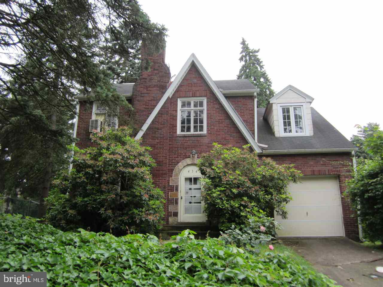 Perfect Paxtang Project! Brick 2 story with 3 bedrooms & walk up finished attic. Laundry room on first level. Fireplace in the living room. One car garage and off street parking. Full basement for additional storage. Private fenced in yard. Directly across from the scenic Capital Area Green Belt. Bring your paint brush and hammer to make this home incredible.