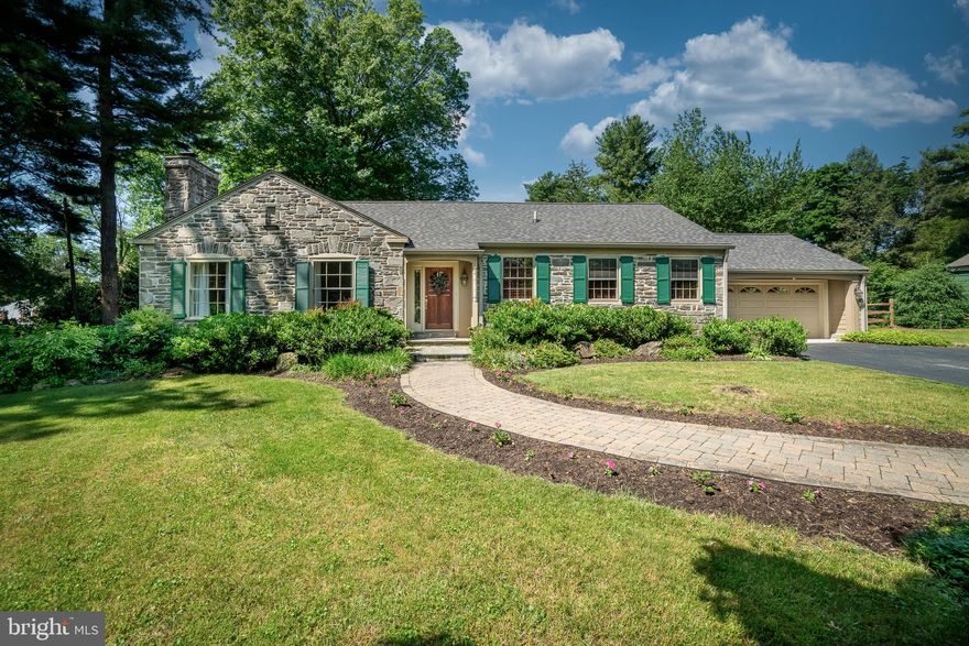 Built by respected local builder E.B Mahoney, this well-maintained 4000+ sf 4BR / 3BA stone-front cape, is located in the esteemed Lower Merion School District. Centrally positioned on a flat, generously-sized lot and set back from the road, this home exudes warmth and elegant charm. Two thoughtful additions have resulted in ample living space and storage, with an easy flowing floor plan. The southwest exposure ensures an abundance of natural light throughout. 

Entering the home, the quality craftsmanship is evident...details such as deep window sills, raised panel woodworking, crown moulding, and pocket doors all add to the allure of this home.  Hardwood floors are found throughout most of the main level. Also on the main level is the Primary Suite, a bright and peaceful sanctuary with 2 walk-in closets. The ensuite bath features a double vanity with granite counters, soaking tub, and zero-threshold walk-in shower. A second bedroom on this level has a full bath, which also connects to the hallway. The open kitchen is flooded with light and features a breakfast area and cozy nook. Directly off the kitchen, you will find the large family room with a stone front wood-burning fireplace. The dining room connects seamlessly with the kitchen, family, and living rooms. Finally, you will find the large laundry/mud room with loads of cabinets, and a door leading to your 2-car garage. 

Upstairs, there are two generous bedrooms with closets and attic storage, as well as a hall bath. The basement is plumbed for an extra bathroom, and currently provides a good option for storage.

Another highlight of this home is the ample outdoor living space. It features a screened-in porch off the Family Room, and an expansive composite deck that is accessible from the Family Room, Kitchen, and Primary Bedroom. The design of the additions creates a courtyard-like setting on the deck and ensures privacy. Plan to enjoy your morning coffee in this peaceful oasis! The large, fully-fenced back yard provides options for play and/or gardening. 

But wait, there’s more! Recent upgrades include a new roof (Dec 2023, including the shed and transferable warranty), whole house generator (Fall 2023), and a back yard split rail fence with wire - perfect for your pets! 

Move right in…and welcome home!  NOTE: seller absolutely loves this beautiful home, but has decided to move to be closer to family.