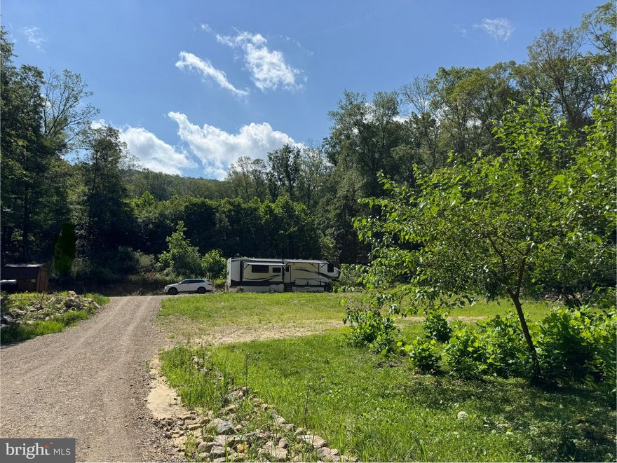 Build Your Dream Property in Wild, Wonderful West Virginia!
Don't miss out on this rare opportunity to acquire an improved property that already has all the ground work done! This 1-acre lot is fully equipped and ready for your vision—whether that’s a full-time residence, weekend retreat, or Airbnb investment. Currently used as a residential RV site, the property features public water, a 3 bedroom septic system, 200-amp electric service, a driveway, and cleared land—saving you time and money on prep work.
This lot backs to woods, offering privacy and a beautiful natural backdrop. With frontage on a hard-surfaced road and easy access year-round, getting to the property is a breeze. You can be to Gainesville Va in about an hour.
Located close to Trout Pond and Lost River State Park, you’ll enjoy endless outdoor activities like hiking, fishing, and exploring. Nearby local restaurants, markets, and historical sites add to the charm of this scenic area.
Don’t miss this opportunity to own a ready-to-build slice of West Virginia paradise!