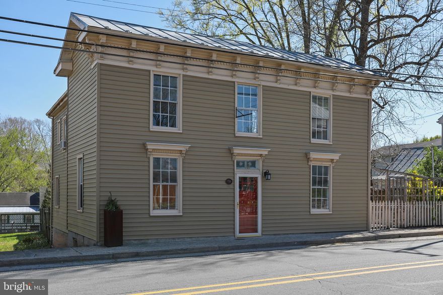 Built in 1879, this updated multi-use property is located in Historic Edinburg, Virginia. Until recently, the
property was home to the very popular “Penelope’s Café”, offering a bakery on the first floor and an
apartment/living quarter on the second floor. The bakery had been approved by the Health and Building
Departments. With 3 bedrooms and 2.5 bathrooms (per tax records), the property could also be used as
a single-family residence. Many upgrades were made between 2012-2014, to include new siding,
decking, replacement of many of the windows, as well as plumbing, kitchen, and bathroom updates. The
first floor offers hardwood floors, a bakery kitchen with 3 ovens and 4 sinks (one with a grease
interceptor and one with a reverse osmosis filtration system), laundry room, 1 full bathroom and 1
handicap accessible half-bathroom. The second floor offers hardwood floors, an updated kitchen,
laundry room, enclosed porch, 2 multi-purpose rooms, a large bedroom and full bathroom. This floor is
ideal for a separate living quarter or expansion space for retail use. The second floor can be accessed
from the outside, or from the interior stairs.  The upstairs and downstairs have separate electric meters, separate water heaters, and are billed by the Town separately for water and sewer. Outside you will find expansive decks on both the first and second level, beautiful landscaping and an outbuilding/shed. For your convenience, the entire back and side yards are fenced in. Don’t miss out on your chance to own this well-kept historic property in Edinburg, schedule your showing today!