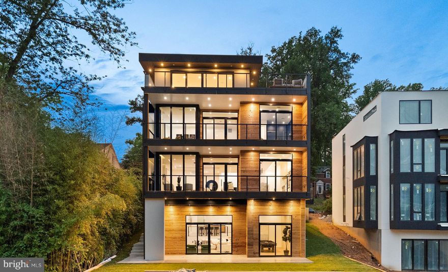 Experience the epitome of luxury living in this breathtaking contemporary home in Bethesda. From the moment you enter through the front door, you'll be transported to a world of sophistication and elegance, with warm and natural finishes showcasing the finest materials from around the world. The interiors exude luxury and style at every turn where indoor and outdoor living spaces flow seamlessly together. This property is not just a home, it's a masterpiece, crafted with the utmost care and attention to detail by some of the world's top designers and builders.
Rooftop pictures will be added soon.