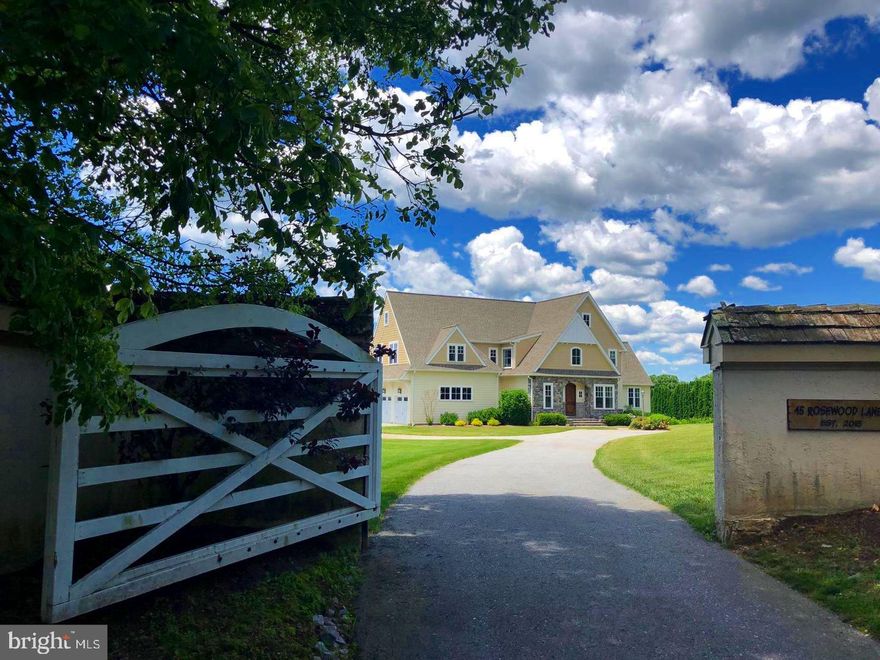 Rare opportunity! Custom Built by John Diament in 2015, this elegantly home sits on 2.6 acres at the end of a quiet cul de sac in desirable Charlestown Township. The home was designed with an open floor plan maximizing natural light throughout. Brilliant high-end rustic sophistication includes hardwood floors and natural light throughout, the home includes a bright kitchen with a picturesque stone wall, copper hood, oversized granite center island, tons of storage and high-end stainless steel appliances and finishes throughout, two gas fireplaces, great room with vaulted ceiling, dining room with vaulted ceiling, bar area, beverage refrigerator, and kegerator, custom staircase with metal features designed by local artist, master suite with rain shower and two spacious professionally organized walk-in closets, three-car garage, first-floor office and playroom (or first-floor bedroom) powder room, mudroom with custom bench and cubbies. Additional touches include hand-picked hundred-year-old barn beams, sliding barn doors to the walk-in pantry, custom light fixture, window treatments, and window seats. The outdoor spaces include a covered Azek deck with a built-in grill, outdoor speakers, and a separate dining area overlooking the fully fenced in backyard. In 2018, a custom bluestone walkway and pool/patio area were added to take advantage of the magnificent sunsets and include outdoor Lutron lighting and speakers, expansive water features, a heated saltwater pool, pool house, and professional landscaping and irrigation systems throughout. The finished walkout lower level includes a second great room, separate workout room, full bathroom, and changing room that easily accesses the pool. The exterior of the home is constructed with stone and upgraded Hardiplank siding with board and batten finishes. The home is heated and cooled by a four-zone system. Just minutes away from major highway arteries, shopping, restaurants, and Great Valley Schools