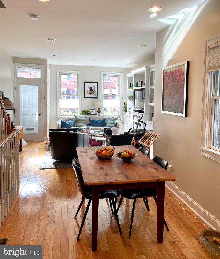 This beautifully maintained three-story home is situated on one of our most desirable blocks, Aspen Street! Enter through the foyer into the bright large living room with gas fireplace and beautiful built-in bookcases, featuring hardwood floors throughout the open concept living-dining area which looks straight through to the charming kitchen featuring stainless steel appliances, a deep sink, a breakfast bar, and large sliding doors that leads to the private large rear yard perfect for summertime barbecues and family gatherings. On the upper level, you will find spacious bedrooms with great closet space a tiled bath, and its own laundry room. The third-floor primary room is top-of-the-line. Just wait until you see this deck with a retractable awning and custom flooring. There are so many cool upgrades in this house! Make your appointment to see this incredible home today!