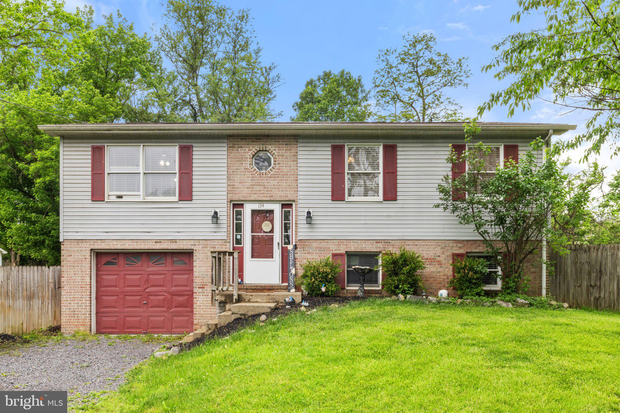 I’m excited to present this beautifully maintained split-level home in the heart of Inwood, West Virginia. Featuring 3 spacious bedrooms and 2 modern bathrooms, this residence blends comfort with contemporary style. The open-concept main level offers a seamless flow between the living room, kitchen, and dining area, making it perfect for everyday living and entertaining. The kitchen is thoughtfully updated with stainless steel appliances, sleek countertops, and modern finishes. The split-level design provides a sense of privacy and maximizes usable space throughout the home. Luxury vinyl plank throughout the house, adds additional character and modern charm.
A true standout feature is the expansive backyard—ideal for outdoor entertaining, gardening, or simply relaxing in a peaceful setting. Located in a welcoming neighborhood with convenient access to I-81, local schools, shopping, and parks, this home offers small-town charm with commuter-friendly access.