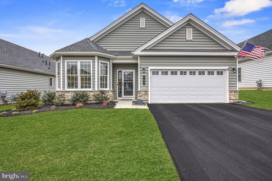 A Traditions of America West Brandywine resale is truly a rare find, but your wait is over! Welcome home to a luxurious 55+ resort lifestyle! Leave your snow blowers and rakes behind, you will never need them again! Instead enjoy a 7500 sq. ft. clubhouse including a grand lounge, sports bar, catering kitchen, simulated golf,  outdoor tennis, pickle ball, heated swimming pool and so much more! 
This beautiful 2 bedroom, 2 full bath ranch style home is situated on a spectacular lot in the heart of Chester County.  The impressive exterior boasts a stone and maintance free vinyl siding facade,  an immaculate 2 car garage, manicured gardens, lush green lawns, an expanded patio with epoxy finish and a WHOLE house generator.
 Upon entering you will be WOWED by the modern  open concept floor plan, stunning Adura Max luxury vinyl flooring and oh so many upgrades and customized features! The vast entrance foyer with its high ceiling  is enhanced by recessed lighting  and leads to a phenomenal living space, which is ideal for entertaining.  Enjoy a quiet conversation in the quaint living room , highlighted by a wall of windows, treated with 3 M window film, which allows just enough light in to nicely brighten the living space without overheating the area. (This tint is on all the back windows including the kitchen, dining area, great room and primary bedroom).  The dining room, with its stylish lighting , is a generous size and could accomodate a formal dining room set so you can host and enjoy those holiday gathering with family. The goumet kitchen has an abundance of upgraded Yorktowne cabinetry, beveled edge countertops, tiled backsplash, recessed lighting, a customized pantry, large center island with seating for 4 on one side and extra cabinets on the other and a seperate dining area. Sliding glass doors lead to a gorgeous 3 seasons room with expoxy finished floor.  This will extend your outdoor enjoyment for many months! The primary bedroom suite is a sophisticated, light filled room accented by a tray ceiling, ceiling fan and 2 large closets. The ensuite bath features a tile floor, large double size shower, elongated custome vanity and stylish lighting. Additionally, there is a generously sized  guest bedroom with luxurious carpeting, a ceiling fan,  ample closet space and lots of windows. The hall bathroom has many upgrades and includes a tub/shower so you can soak after a hard day of work or play! A large bonus room, currently being used as a very efficient home office could easily be converted into a 3rd bedroom if needed. This Washington Model floor plan is very versitile, allowing you lots of options! A laundry room with a large load washer and dryer complete this first level. A second level attic, drywalled, with both heat and air, is currently being used for storage, and there is plenty of it!
Some of the customized upgrades/ enhanced features include: The three seasons room, whole house generator, Ring doorbell, rear window tinting (3 M Window Film), solar attic fan, attic heating and cooling vents, wainscoting, extended patio with epoxy finish, active security system, Adura Max luxury vinyl, recessed lighting, door handles and hinges Venetian Bronze finish, kitchen cabinets Henning Maple full overlay, 42' Yorktowne kitchen cabinets, bathroom vanities, pantry pull out trays, counter tops in kitchen Silverstone surface, upgraded refrigerator, dishwasher, range, upgraded front door Therma-Tru and much more! This community is close to shopping, entertainment, restaraunts, cultural events, parks, recreation and convenient to many major highways. But with everything this community has to offer, why would you ever want to leave?  This truly is Home Sweet Home!