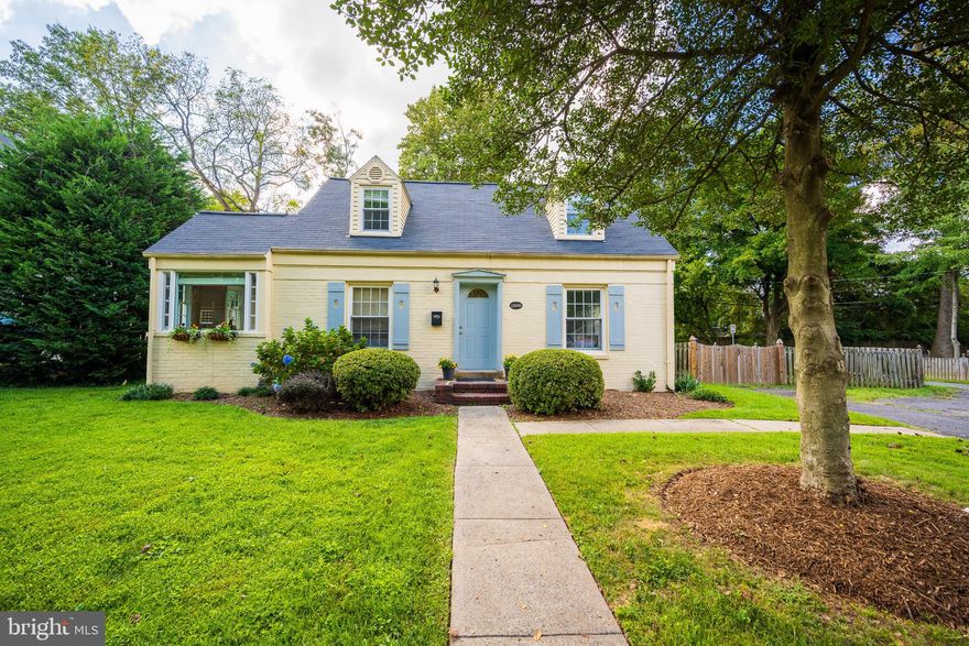 Welcome to this Cape Cod home in the coveted Greenway Downs neighborhood in Mason Terrace. Situated on a 
large corner lot, surrounded by uniquely beautiful homes, this charming brick residence exudes its own charm and character.  There is plenty of room to expand out back or tear own and build. Hardwood floors flow throughout the main level bedrooms and living room. The home has three bedrooms: 1 main level full bath with a double sink vanity and tub shower, with 2 bedrooms and one upper-level bedroom. The kitchen features ample cabinet storage, granite countertops, and stainless steel appliances.   Located off of the kitchen is a main-level laundry room with access to the rear deck and pergola. Off of the living room is a cozy ceramic tile dining room/sunroom/office that opens to a wrap-around side deck and a large fenced backyard with a storage shed. The upper-level primary bedroom features dormer windows adding a touch of character. Convenient dual-entry driveway for 2 cars. The fenced rear yard offers space and privacy for outdoor activities making it an ideal retreat Close proximity to everything... the East Falls Church Metro Station, restaurants, parks, farmers market, and shopping.  Greenway Downs was even listed as one of the Top 10 Great Neighborhoods in 2022 by Arlington Magazine.