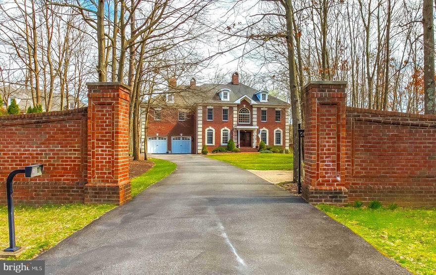 Welcome to Dreams Point in Jamestown on the Magothy.  Stunning architecture, fine fit and finish, gated driveway, pristine condition, and deep protected water are only a few of features that make this property a true gem.  Situated on a private lot, and built at an ideal elevation above Forked Creek, this custom brick 5 bedroom/4 baths/2 half baths home features beautiful wood floors, custom trim, a mosaic tile foyer, impressive curved staircase, 4 gas fireplaces, an exquisite  gourmet chef's kitchen with custom cabinetry,  luxury appliances, two large pantries, a breakfast area, two custom work stations and a gourmet coffee bar.  This home also offers a waterfront great room with soaring ceilings, a stately main level home office with gas fireplace, over a dozen Swarovski crystal chandeliers throughout the home, expansive master suite with luxury bath and separate walk-in closets, waterfront screened porch and deck, and many other features you would expect to find in a home of this quality craftsmanship.  The expansive lower level includes an au-pair/guest suite, family room with custom built-ins, game room area, gym/yoga area and a large storage and workshop area. The discreet and maintenance free solar panel system provides clean energy and a significant reduction in energy costs. Ideally located for enjoying the best of what our area has to offer by land or water.  Great access to the Chesapeake Bay, and a short ride to Dobbins Island, Dreams Point is a boater's dream.  The deep water pier is very protected and includes water, electric and a Magnum lift.  Welcome to the best of waterfront living on the Magothy River.