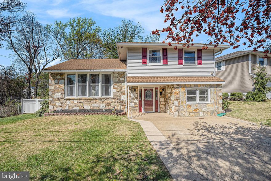 Welcome to your beautifully updated 4-bedroom, 2.5-bath split-level home in the sought-after Pine Valley neighborhood of Northeast Philly!
This move-in ready gem offers everything you need to settle in just in time for spring. With spacious, light-filled interiors, neutral custom paint throughout and a generous 10,000+ sq ft fully fenced lot perfect for summer barbecues, gardening, or simply soaking up the sunshine. Step inside to a welcoming tiled foyer with abundant built-in storage and two flexible living spaces on the first level that may be ideal for a guest bedroom, home office, or cozy den, plus a convenient half bath.Up just a few steps, the heart of the home awaits: a bright, open-concept main floor featuring cathedral ceilings and large windows that flood the space with natural light. The modern kitchen is a chef’s dream, complete with stainless steel appliances, granite countertops, an island, and sleek cabinetry and open to the spacious living and dining areas. From here, step through sliding glass doors onto your large, private, covered deck. The perfect spot for morning coffee or evening unwind. Upstairs, you’ll find a generous primary suite with an updated en-suite bath, along with two additional bedrooms and a second renovated full bathroom. The finished lower level adds even more flexibility with a laundry area and bonus space for a media room, gym, or playroom, whatever suits your lifestyle. Hardwood floors under carpets. Nestled in the Pine Valley section of Bustleton, just one block from the city limits, this home offers easy access to  Greenberg  and St. Albert’s schools, local parks, shopping, dining, and major commuter routes.
Expected April 24,2025