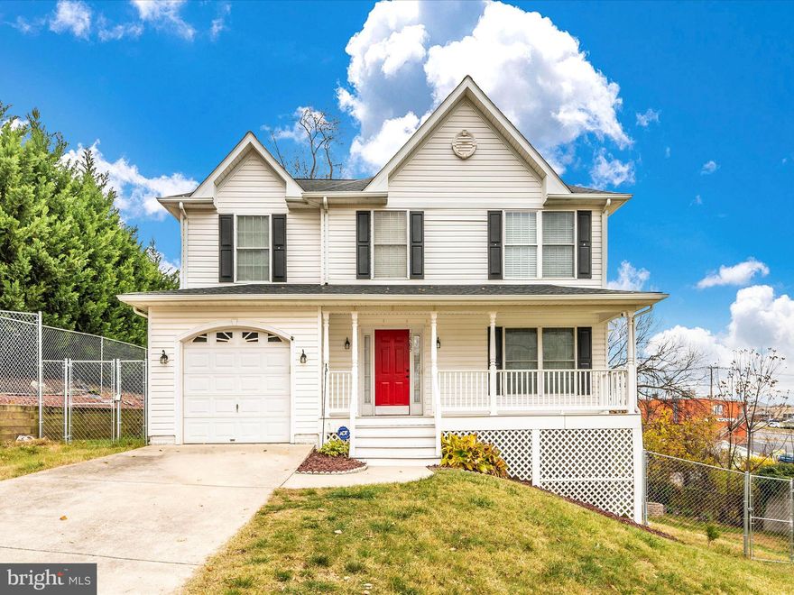 Don't miss out on this adorable colonial style home with cozy front porch, fully fenced rear yard, and large deck for entertaining. You'll love the hardwood foyer entryway with half bath and columns that open into the family room with gas fireplace. In the rear of the home is the kitchen with white cabinets, super cute (blue) painted island, stainless steel appliances, and a sliding door that opens to the trellised rear deck and large yard. Just off the kitchen is the perfect sized dining room for those holiday gatherings or family meals. The stairway to upper level sits in between the dining and family rooms, you'll immediately notice the brand new carpet that was just installed throughout the upper level. There's a large master suite just at the top of the steps and to the left with a master bath with separate shower, soaking tub, and large vanity. The other 3 bedrooms are generously sized with ample closet space and natural light. There's also a a 2nd full bath on this level for the use of your guests or additional family members. The basement is fully finished with a full bath, level walkout to side yard, large rec room and laundry closet. The basement, as well as much of the home, was just freshly painted,  and also professionally cleaned, so it's ready for new owners! OFFER DEADLINE- 8 AM FRIDAY 12/5.