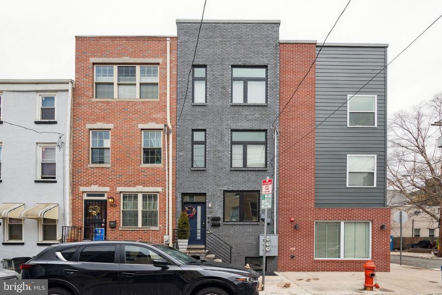 Welcome to 1919 Brown Street! This beautiful newly renovated 3 bedroom, 3 bathroom home resides in the Fairmount neighborhood of Philadelphia! As you enter the home, you will immediately notice the open concept living and dining area. This space features large windows allowing for tons of natural light. The kitchen boasts white hex tile backsplash, dual-toned white and green cabinetry, stainless steel appliances, and gold fixtures. This level also houses a bar area leading to 1 bedroom and 1 bathroom. Upstairs you will find 2 spacious bedrooms, each with ample closet space and 2 full bathrooms. Finally, make your way to the private rooftop deck with skyline views! This is the perfect space to entertain guests. In close proximity to all of the restaurants, bars, grocery stores, and coffee shops that Fairmount has to offer. Schedule your showing today!