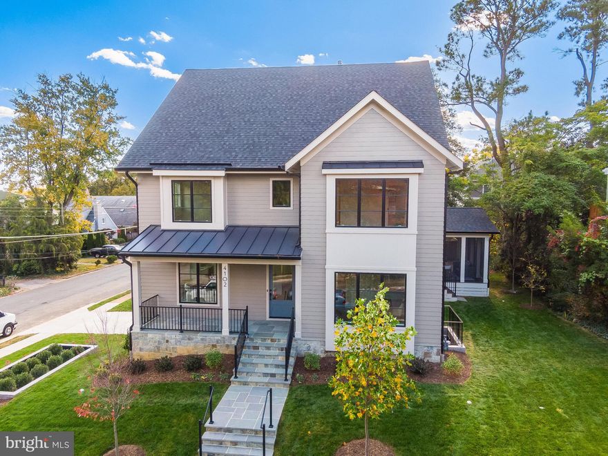 Stunning New Home in Cherrydale by Springstreet Development.
Located on a quiet street just steps to schools, trails, and shops—with easy access to DC via Rt 66 and Metro—this sun-filled home offers southern exposure and beautiful morning light throughout the day. Thoughtfully designed with an open, flowing floor plan perfect for entertaining and everyday living.
The main level features a spacious family room with linear stone fireplace and coffered ceiling, gourmet kitchen with quartz countertops, marble backsplash, custom cabinetry, and professional-grade Sub-Zero & Wolf appliances. Formal dining room, private study/bedroom with full bath, large pantry, and mudroom with built-ins. Screened porch with heaters and rear deck with gas hookup for grilling or fire pit.
Upstairs, the primary suite offers a serene retreat with 10.5’ coffered ceiling, custom closets, and a spa-like marble bath with heated floors and oversized shower. Three additional bedrooms, two full baths, and laundry with cabinetry complete the level. The loft includes a bar, full bath, and covered outdoor deck with stunning views.
The lower level boasts a large rec room with entertainment bar, bedroom/exercise room, full bath, and ample storage. Quality finishes throughout—Andersen windows, 400-amp service, dual-zone HVAC, cast iron tubs, Delta fixtures, oak stairs, and upgraded insulation for sound and energy efficiency. Professionally landscaped yard, slate walkway, Trex decking, and oversized 2.5-car garage.