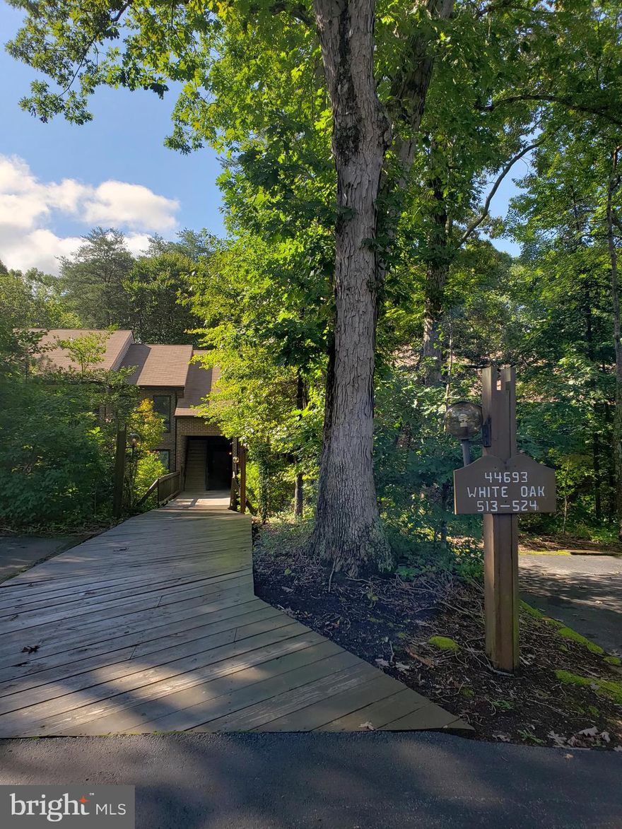 Top level condo convenient to shopping, groceries, entertainment.  Needs new flooring, paint, etc.  Great opportunity.