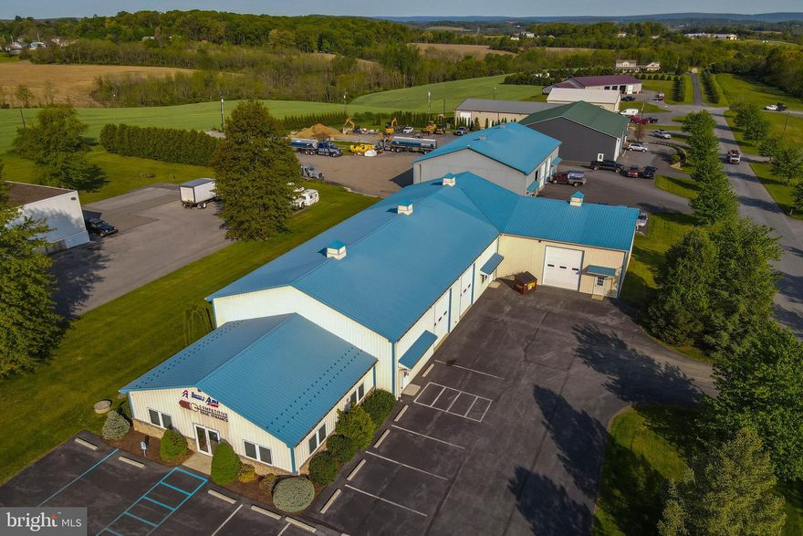 PRIME 8,880 SQ FT COMMERCIAL WAREHOUSE & OFFICE/RETAIL SPACE! Lowhill Township! Pristine condition! BUILDING ONLY FOR SALE!Minutes from Route I-78, 309, 22 & PA Turnpike! Situated on an acre of land with other industrial related business's nearby! Retail/Office space consist of 1,280 sq feet with NEW central air/heat, two main offices, cubicles, kitchenette, retail display & ADA compliant bathroom! Entire building is Vapor Wrapped(walls & ceilings)! Main warehouse is 80x50x24, includes plumbing for a future bathroom. Warehouse addition is 40x90x24. Entire warehouse space is complete with radiant heat within the concrete floors, 16' ceilings, security system, UV protectant windows, 14' garage doors with drive in loading bays, secured side entry for after hours pick-ups or drop-offs. Paved & marked parking for 14+ vehicles! Mechanicals consist of 400 amp service, well water, septic sewer, above ground oil tank, oil burner, manifold shut offs & all NEW overhead LED lighting. Built in 2005