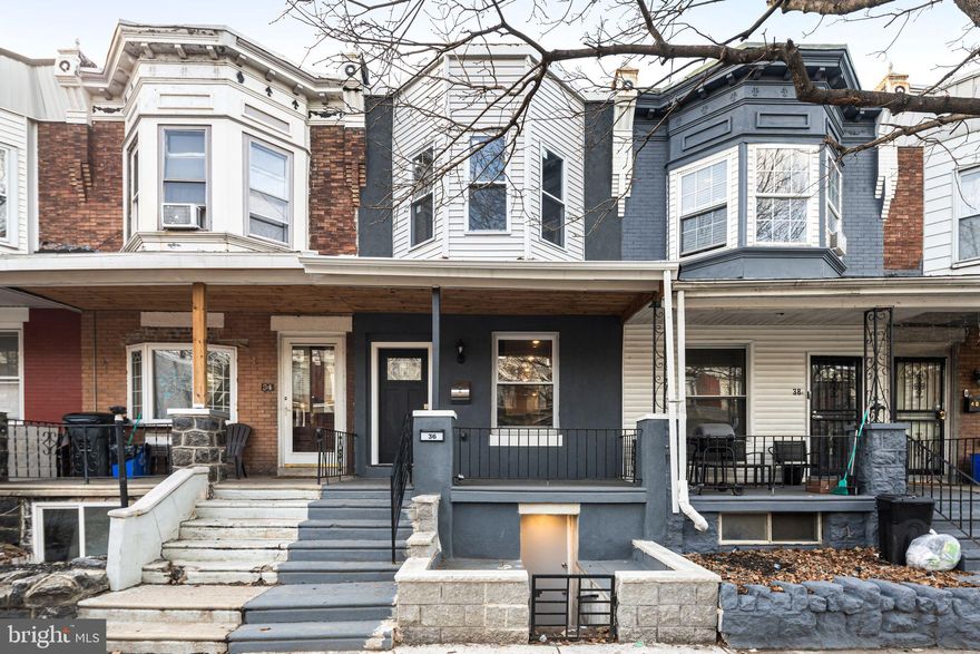 The property can qualify for up to $17,500 in grant money!

Welcome to this charming interior row home in the desirable Haddington neighborhood! Featuring a cozy front porch, this home offers spacious living in a prime location. As you enter, you're greeted by a bright living room with a large window and stunning exposed brick that runs throughout the entire first floor, seamlessly flowing into the kitchen. The updated kitchen is a chef’s dream, with brand new appliances, sleek grey and white cabinetry, marble flooring, and a window above the sink. The kitchen island provides the perfect space for hosting and meal prep.

The first floor also includes a convenient laundry area and a half bath. Upstairs, you'll find three generously sized bedrooms, including a main bedroom with a large bay window that fills the room with natural light. The full bathroom features a beautiful marble-lined bathtub. The two additional bedrooms are spacious and offer ample light, perfect for a variety of needs.

The basement offers additional potential with a half bathroom and plenty of room for entertaining, a home gym, office, or extra storage. Don't miss the opportunity to make this charming home yours!