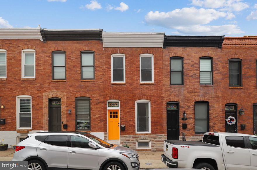 GORGEOUS ROW-HOME NOW AVAILABLE ON QUIET AND SOUGHT-AFTER BLOCK IN CANTON WITH OFF-STREET PARKING PAD. 3 BEDROOMS WITH 1.5 BATHROOMS.  GLISTENING RECLAIMED HARDWOODS CASCADE THROUGHOUT MAIN LEVEL. ENJOY ESPRESSO CABINETRY, GRANITE COUNTERTOPS, OPEN CHEF'S KITCHEN. TONS OF NATURAL LIGHT. EXPOSED BRICK. FINISHED LOWER LEVEL WITH LAUNDRY. HISTORIC TIN CEILINGS. TONS OF STORAGE. CLOSE PROXIMITY TO RETAIL SHOPPING, LOCAL DINING, PATTERSON PARK, AND ALL MAJOR HIGHWAYS. SCHEDULE A PRIVATE TOUR TODAY.