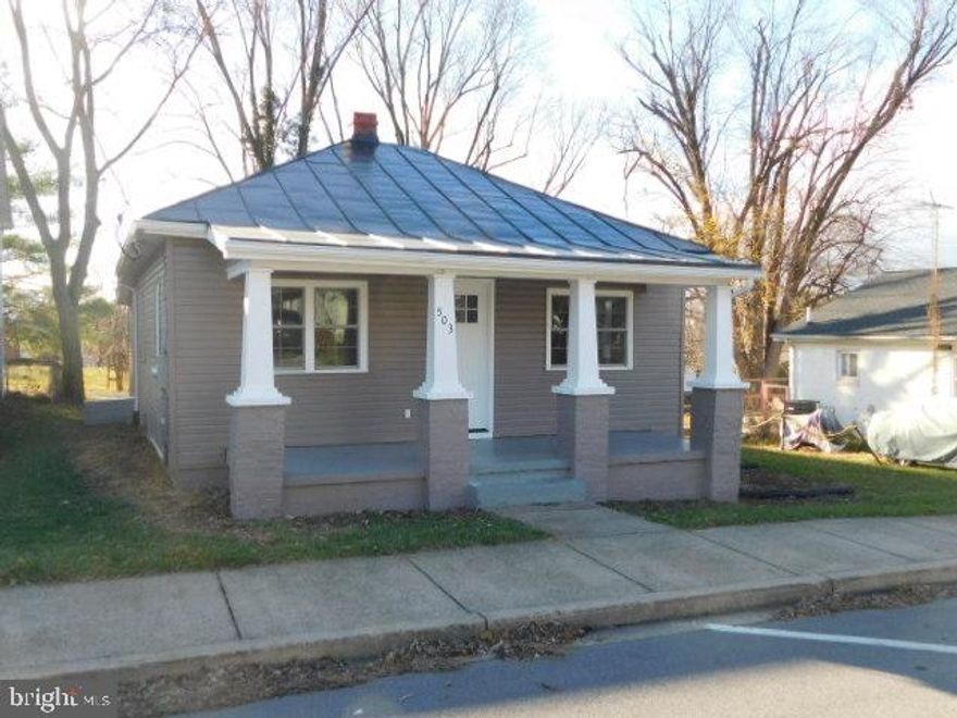Check out this beautifully renovated bungalow in Ranson! This is a completely different house than before. All new windows and all new flooring throughout. All the appliances have been replaced. The bathroom has been completely renovated. The owner added more insulation in the attic and installed a brand new heat pump. On the exterior, all the siding has been replaced and the front porch was renovated. Everything has been freshly painted.  There is a large sitting room off the 2nd bedroom that you can use for whatever you need it for. The house is ready for you!