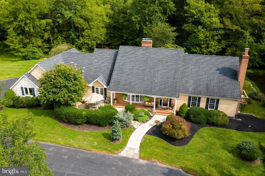 Hard to beat this location abutting Fair Hill Equestrian facility and thousands of acres of open space in Cecil County, Md. Expansive custom-built Cape-style house, beautifully planted, protected by open space. House is unique, custom built in 1989 with 11 foot ceilings throughout first floor; open foyer, sweeping staircase to second floor. Library with FP, beautiful wood-beamed ceiling, and fresh wall-to-wall carpet. First floor Primary Bedroom on suite with private deck; kitchen with custom cherry cabinets, includes Wolf microwave, Subzero refrigerator, propane gas stove, granite countertop island; family room off kitchen with FP and wet bar; mud room, first floor laundry room, powder room off kitchen leading to large well finished 3 bay garage with equine storage area, and ample closet space. Family room, kitchen, Primary bedroom, all have French doors leading to expansive outdoor deck overlooking beautiful pond, gardens and woods. Second floor has 3 BRs, one very large full hall bath, Jack-&-Jill bath between second and third BRs; small office space potential or record storage, full attic space above garage. Finished basement with real wood paneling and outside exit through French doors, another finished room would make an excellent office; basement utilities room, 2-zone heating and central air throughout, water conditioner, and crawl space with new air circulation system, sump pump, and built in dehumidifier. Roof redone in 2010. A highlight of the property is its proximity to walking, biking, and riding trails with Fair Hill Equestrian Center to the west, and White Clay Creek Preserve to the north. Unique location and setting with similar types of properties nearby. Close to Univ. of Del., Newark, I-95. Great location. Please do not drive down the driveway, by appointment only, thank you:) 24 hour notice for showings