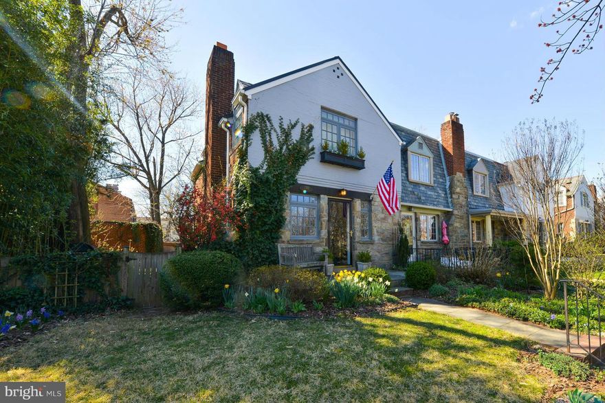 **BEAUTIFULLY UPDATED 1930'S ENGLISH COTTAGE**IMMACULATE END HOME W/1 CAR GARAGE HAS A LUX GRANITE KITCHEN W/CUSTOM CABINETS, GE SLATE APPLIANCES, HUGE GRANITE ISLAND, HW FLOORS, UPDATED BATHS W/SKYLIGHT, MARVIN CLAD CASEMENT WINDOWS, NEW SLATE ROOF, REFINISHED BASEMENT W/FULL BATH & MORE.  THE EXQUISITE BACKYARD W/BRICK PATIO/PATH, DECK, PERGOLA, FOUNTAIN IS SURE TO PLEASE. WALK TO DINNER & MORE!