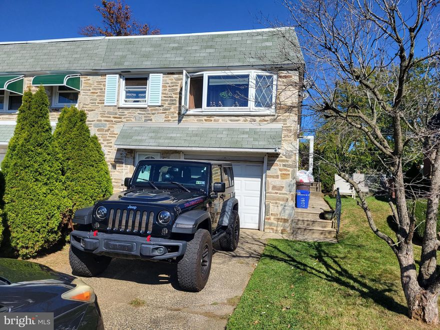 Showings Begin on Friday, October 31, 2025. Property is occupied by tenants, and a 24-hour notice of entry to the property is required. 1907 Nester is ready for you to move in and enjoy! This twin ranch is beautifully updated and has plenty of storage! The Main Level of the home has hardwood floors, a spacious living room, a beautiful kitchen with tasteful wooden cabinets, ceramic tile floors, stainless steel refrigerator, and modern dark green countertops. In addition, the Main Level has a full bathroom and 2 nice sized bedrooms with plenty of closet space. Lower Level features a primary bedroom that has new laminate floors (this primary bedroom can also be used as a family room), a powder room, a laundry room, and a 1 car garage. New rubber roof was installed in August 2021. A Spacious fenced backyard offers the perfect space for relaxation, hanging out with friends, or starting a garden. Close to shopping, restaurants, public transportation, schools, hospitals, both Bustleton Avenue and Roosevelt Boulevard. Don’t wait, make your appointment today!