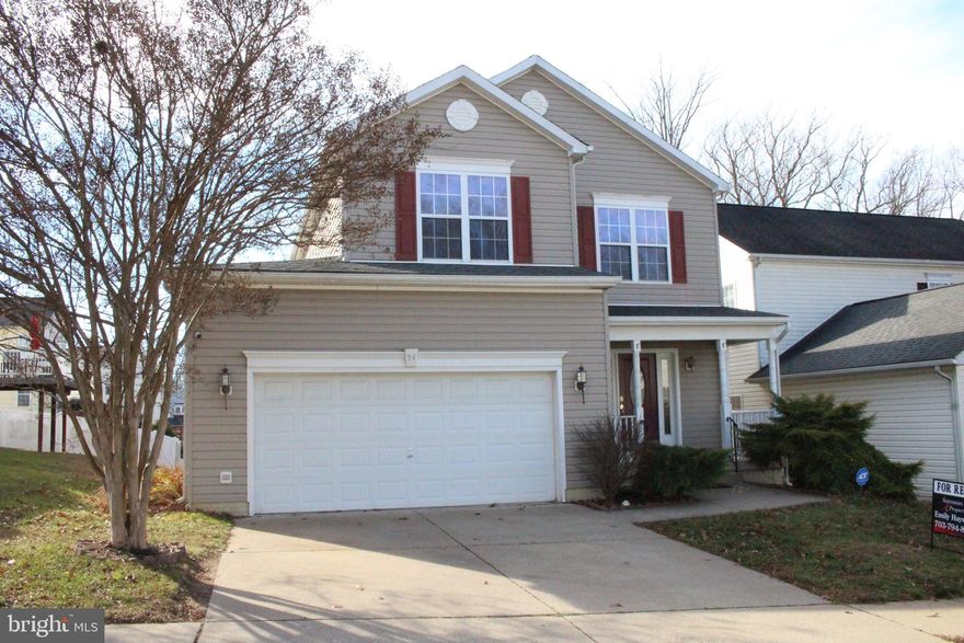 Great price on this wonderful 5 bedroom, 3.5 bath colonial conveniently located off Rt 1 near Quantico.  Lovely breakfast area off the kitchen that walks out to the deck and backs to trees.  Fireplace in the living room and a separate dining room with hardwood floors. The primary bedroom has a full bath with a separate shower and multiple closets. The other 3 bedrooms are generous in size and have large closets. The basement has a 5th bedroom, full bath and family room.  Walks out to the backyard.  Community pool, trash, and lawn care are provided.  Gated community.