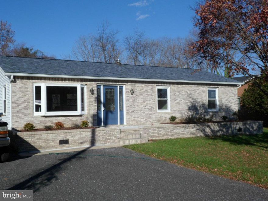 Come take a look at this great buy!  Totally remodeled and renovated.  Complete with new well, windows, flooring, appliances,  and heat pump. Open floorplan with quality lament flooring in main areas & new carpeting in bedrooms. Updated baths with ceramic tile floors and tiled shower. Tastefully painted  & move in ready.  Level yard with back patio and fenced in backyard.