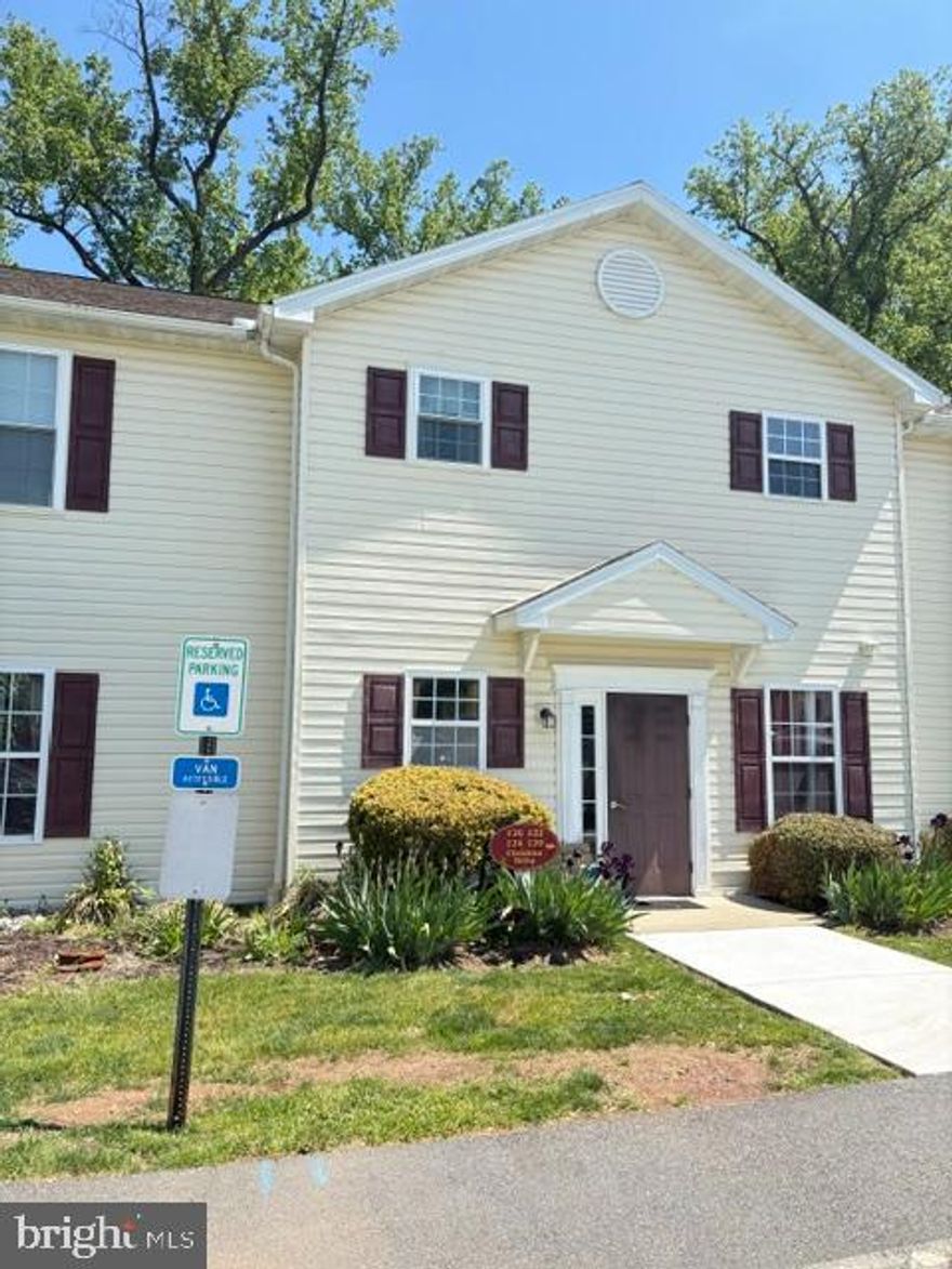 If you're looking for true one floor living with no steps or curbs, this is it!  Located in the newer section of this complex with close access to major roads, yet tucked away in a quiet development is where you'll find this gem with easy parking right outside your condo for a quick trip from your car to your home.  This easy living lifestyle continues with brand new luxury vinyl plank flooring, a new energy efficient HVAC system, a new hot water heater, a new washing machine, and all appliances remaining.  Lawn care and snow removal is also taken care of for you!   The primary bedroom, located in the back of the unit, offers a generous walk-in closet and full bath with a walk-in shower, and a 2nd bedroom and another full bath is located in the front of the unit.  A cozy gas fireplace provides ambiance and warmth during the winter months, and from spring to fall you'll find yourself living outside on your private patio that backs up to a wooded backdrop and a walking trail, providing a peaceful oasis.