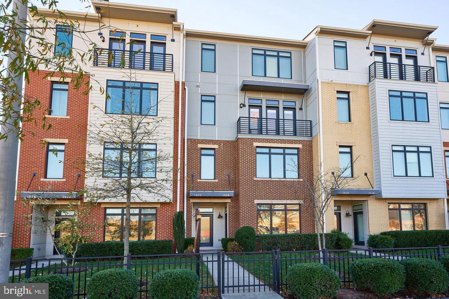 Beautiful Modern Townhouse in an Unbeatable Location! Experience the ultimate convenience and style with this stunning upper-level 2,700 sqft townhouse condo, perfectly situated just steps from the vibrant Village at Leesburg. Enjoy shopping, dining, a movie theater, Wegmans, a dog park, and more—all within walking distance. This 3-bedroom, 2.5-bath home is designed for modern living, featuring an open-concept layout, soaring ceilings, and rich hardwood floors. Oversized windows and a Juliet balcony fill the main living areas with natural light, while a dedicated home office space provides added functionality. The chef's kitchen is a true showstopper, complete with a spacious island, sleek white cabinetry, stainless steel appliances, and elegant granite countertops. Upstairs, the luxurious primary suite offers a peaceful retreat with a walk-in closet and an ensuite bath boasting a soaking tub, separate shower, and dual vanities. Two additional bedrooms share a well-appointed hall bath, and the conveniently located upper-level laundry adds to the ease of living. Parking is a breeze with an attached 1-car garage and a long driveway for additional vehicles. Enjoy easy access to Route 7, Route 15, and the Dulles Greenway, making commuting a breeze. Plus, lawn maintenance, water, sewer, and trash are included in the condo fee. Don’t miss the opportunity to call this modern gem home—schedule your tour today!