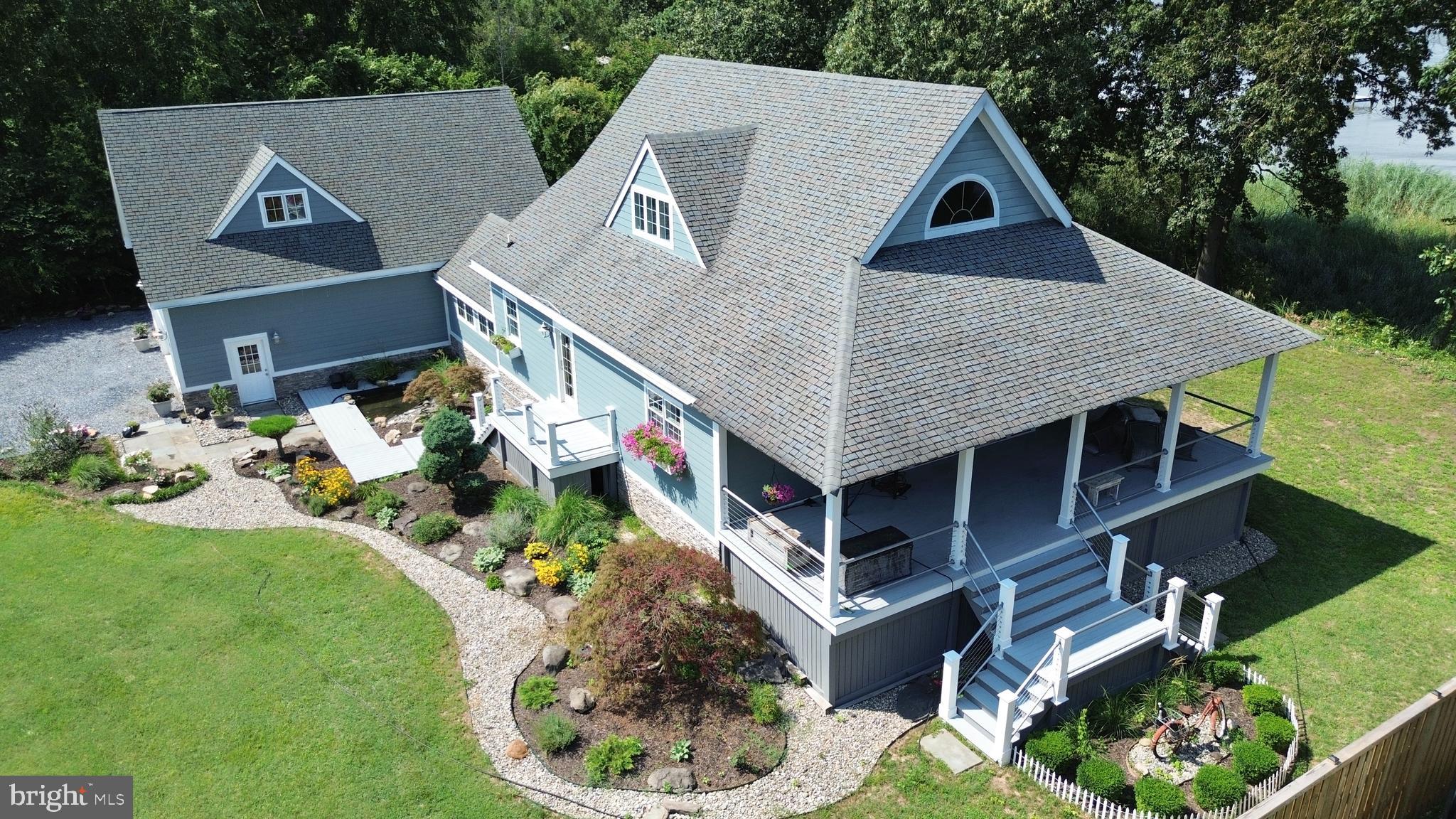 Great opportunity to own a waterfront property on the scenic Chester River! This beautifully landscaped 3 bedroom, 2 bath home with a wraparound porch offers stunning views. There is an additional partially finished 700+/- sq ft space over the garage, filled with natural light and river views, ideal for extra bedrooms with bath, master bedroom or an in-law suite. Tucked away in a peaceful, private setting on a quiet dead-end road, this property is just a short distance from the historic town of Chestertown, offering the perfect blend of seclusion and convenience. Enjoy the ease of a walk out basement. Bring your vision and make this waterfront gem your own!