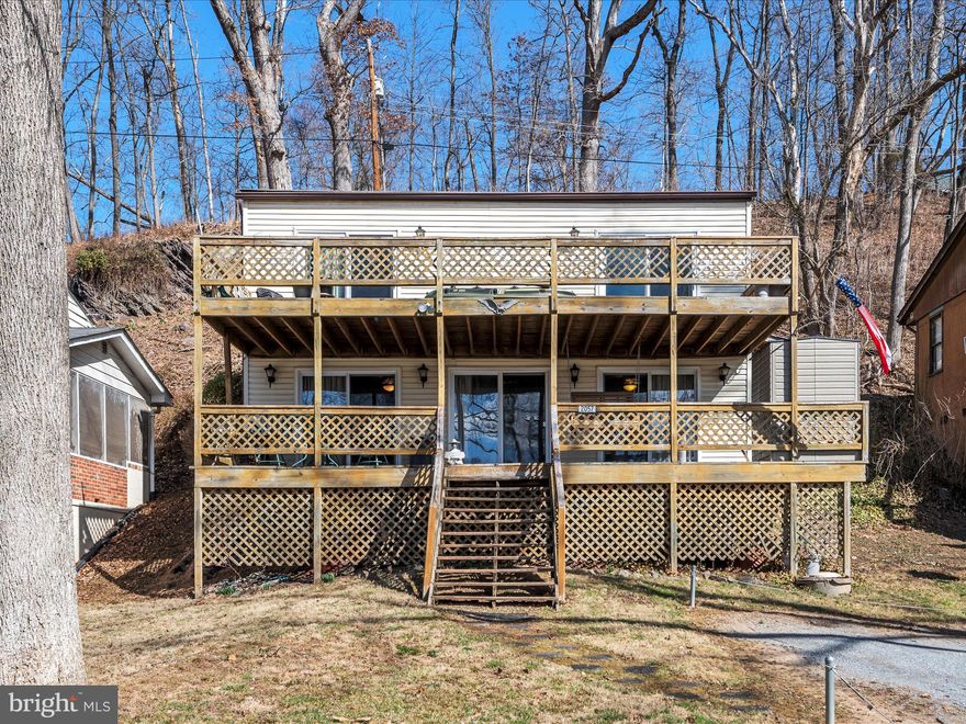 Welcome to 2057 Lockes Mill Road, a rare waterfront gem offering endless opportunities—whether as a primary residence, a second home, or an investment property. Nestled right on the banks of the Shenandoah River with direct access just steps away, this 3-bedroom, 2-bath retreat is the perfect escape from the hustle and bustle of city life.

Designed for both relaxation and entertainment, the home features an open-concept layout with abundant natural light and a two-story front porch spanning the entire width of the home—the perfect spot to take in breathtaking river views. With year-round access to outdoor adventure, this home is an ideal getaway in any season—whether you’re kayaking, fishing, tubing, or simply unwinding by the water. The prime location makes it a fantastic investment for short-term rentals, vacation home potential, or a private retreat just a short drive from the city.

Escape the noise and embrace the tranquility of riverfront living—all while enjoying the benefits of a sound real estate investment. Don’t miss this incredible opportunity!

Schedule your private showing today.