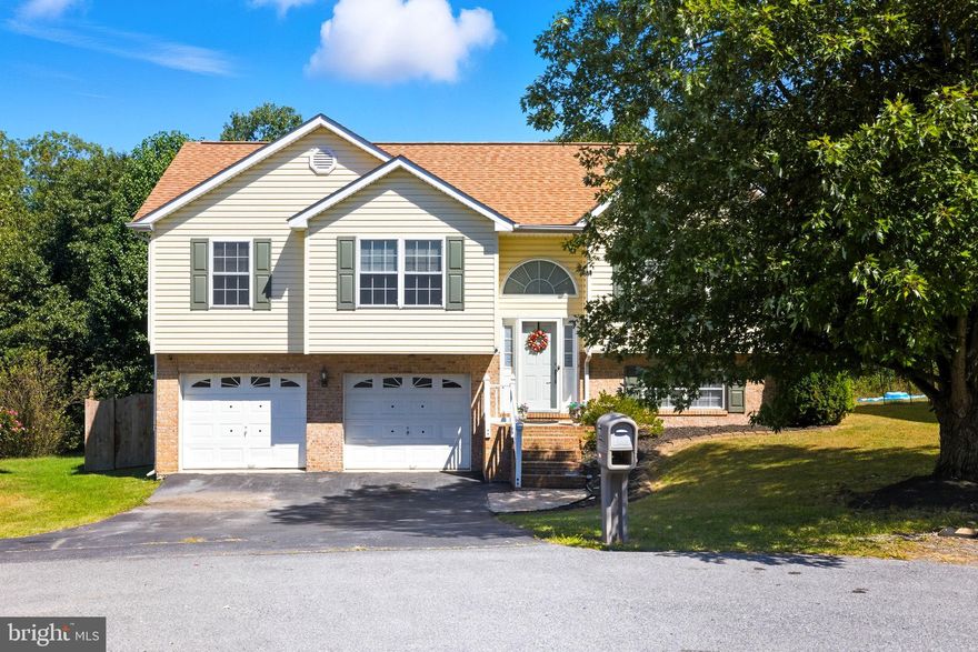 Welcome to this inviting split foyer home tucked on a quiet cul-de-sac in Wildflower Ridge. With over 1,600 finished square feet, this 3-bedroom, 2-bath home offers flexible living space, multiple decks, and unique features you won’t find anywhere else.

The main level features a bright family room with oversized windows and durable LVP flooring that continues through the dining and kitchen areas. The kitchen includes stainless steel appliances and ample storage, while the adjoining dining room opens to a screened covered back deck, perfect for outdoor meals, coffee mornings, or relaxing year-round.

The primary suite is a private retreat with an attached en suite bath and its own private deck. Two additional bedrooms share a full hall bath, completing the main level.

Downstairs, the recreation room features a cozy pellet stove and walk-out access to the backyard. Just steps away is a one-of-a-kind she-shed with electric heater, ceiling fan, porch swing, full electric service, and a lockable doggy door, a fun and functional bonus space for hobbies, pets, or relaxation. The lower level also includes a generous laundry room, large enough to double as a home office, workout space, or craft room.

With spacious living areas, indoor and outdoor gathering spots, and thoughtful extras, this Wildflower Ridge split foyer is ready to welcome its next owner. Don’t miss your chance to call this charming home yours!