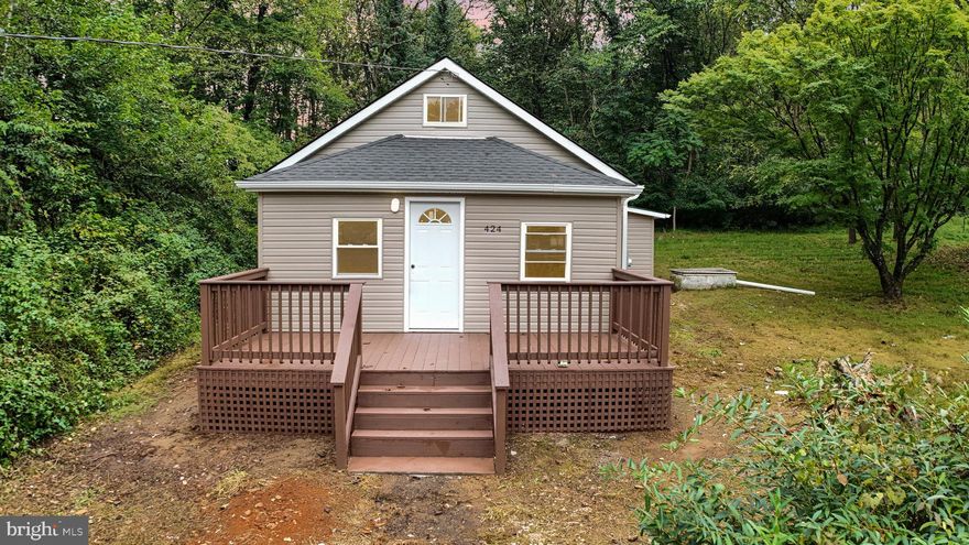 Discover this charming 2-bedroom, 1-bath single-family home nestled in the peaceful rural setting of Cecil County. Situated on just shy of an acre of lush land, this residence offers both comfort and convenience. Highlights include a brand-new roof, inviting front porch perfect for relaxing or entertaining, and modern finishes throughout. The kitchen boasts elegant quartz countertops complemented by stainless steel appliances, while the laminate flooring adds a stylish, easy-to-maintain touch. Ideal for those seeking tranquility and a move-in ready home, this property is a wonderful opportunity in a serene countryside location.