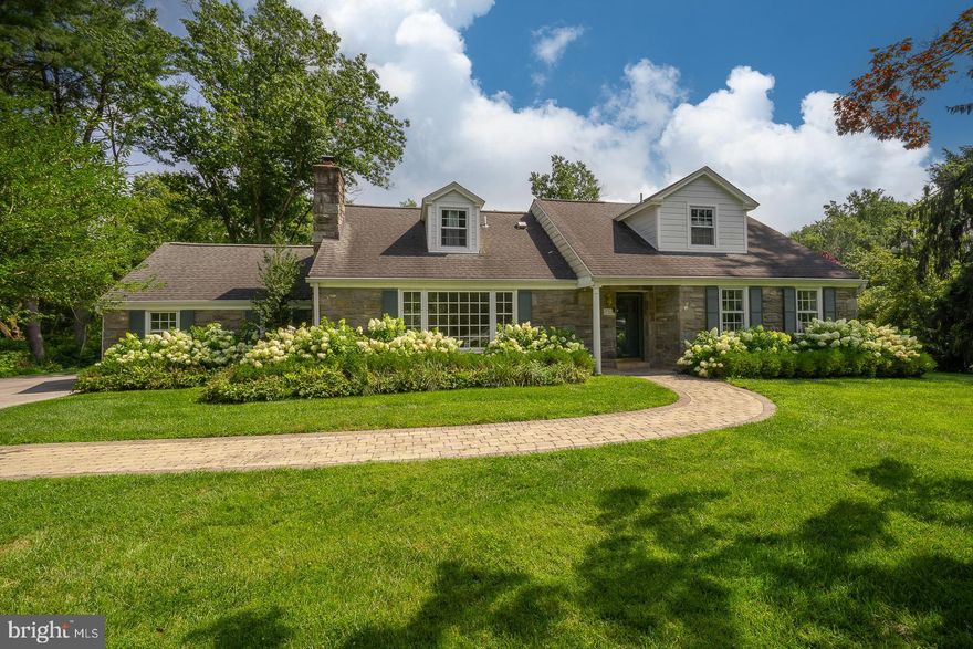 Welcome to 721 Hamilton Road, a 4-bedroom stone cape on an almost one acre property in a quiet Radnor Township neighborhood.  This is one of those houses you've been waiting for.   As you step inside, you'll see a spacious Living Room to your left with picture window and wood burning fireplace that leads into the Dining Room,  also with a  picture window.  The large eat-in kitchen, is centrally located and open to the Breakfast Room and Family Room with gas fireplace and built-ins, all with magnificent, sunny views of the fully fenced back lawn and maturely landscaped lot.   A “smart” Samsung refrigerator, stainless steel appliances, double-wide pantry and peninsula with seating for four are just some of the amenities in this "heart of the home" kitchen. Nearby you'll find a wet bar and Powder Room. The Main Level also features a dedicated private Office and the Primary Bedroom with a custom outfitted walk-in closet, additional closet and a large Primary Bathroom.  
The Second Floor has three good sized bedrooms, one of which with an En-Suite Bathroom, while the other two share a beautifully renovated Hall Bathroom, floored Attic space for storage. Large, unfinished Basement with access window could be finished for extra recreational space.  This private property offers a perfect spot for outdoor gatherings, outdoor activities as well as being a haven for peaceful everyday life.
Located on a lovely cul-de-sac street, this home is in the award-winning Radnor School District and is just minutes from Ithan Elementary, conveniently situated only 10 minutes from the center of Bryn Mawr and Wayne, where you can enjoy a variety of shops, restaurants and access to the R-5 train.   A great opportunity in Radnor Township.