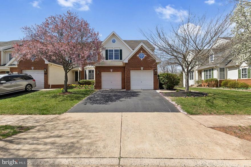 Escape to tranquility in this stunning 4-bedroom, 2 full and 1 half-bath end-unit townhouse located in the prestigious **Dominion Valley Country Club**! This beautifully maintained home welcomes you with a spacious formal living room, elegant formal dining room, and an inviting family room featuring a cozy gas fireplace—perfect for relaxing evenings. Step outside from the family room to a private rear deck, where you can enjoy serene views of the lush backyard backing to woods and Little Bull Run Creek.  

The gourmet kitchen is an entertainer’s dream, boasting quartz countertops, sleek stainless steel appliances, and a charming breakfast nook flooded with natural light. Upstairs, retreat to the luxurious primary bedroom complete with a walk-in closet and en-suite bath. Three additional bedrooms and a full hall bath provide ample space for family and guests.  

The fully finished lower level features a spacious recreation room that walks out to the backyard, perfect for hosting gatherings or enjoying quiet moments with nature. Stay fit and active in the dedicated fitness room, conveniently located on the lower level. Plus, with 220 power already installed in the 2-car attached garage, your electric vehicle charging station is ready to go!  

Situated within the gated Dominion Valley Country Club community, this home grants access to a wealth of resort-style amenities. Residents can enjoy membership to the golf courses, 7 outdoor pools, 1 indoor pool, 5 tot lots, 3 tennis courts, 4 basketball courts, 2 volleyball courts, and scenic fishing piers. The community also features the exclusive **Waverly Club**, offering year-round indoor swimming, a fully equipped workout room, reservable event spaces, and outdoor recreational areas.  

Nestled on over 2,000 acres of beautifully maintained grounds, Dominion Valley offers 26 miles of roads, 30 miles of sidewalks, and 12 scenic trails. Eight manned and remotely controlled gates ensure privacy and security while providing convenient access to major routes. The community's prime location off Route 15 (James Madison Highway) and just 2 miles from I-66 (Exit 40) makes commuting a breeze. Enjoy nearby shopping, dining, and entertainment at Dominion Valley Market Square.  

Experience luxury living in one of Northern Virginia’s most desirable communities—don’t miss your chance to make this stunning townhouse your new home. Schedule your private showing today!